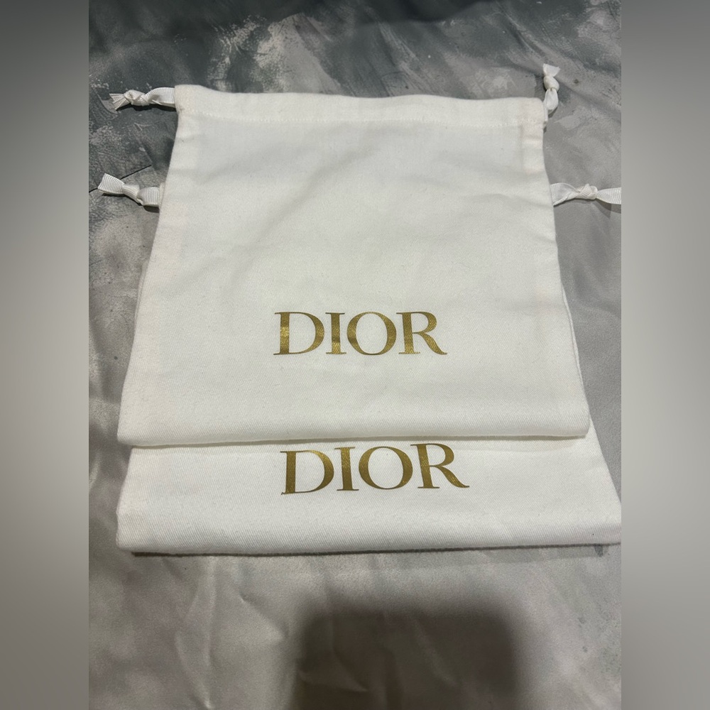 Dior Cream Pouches with Gold Logo